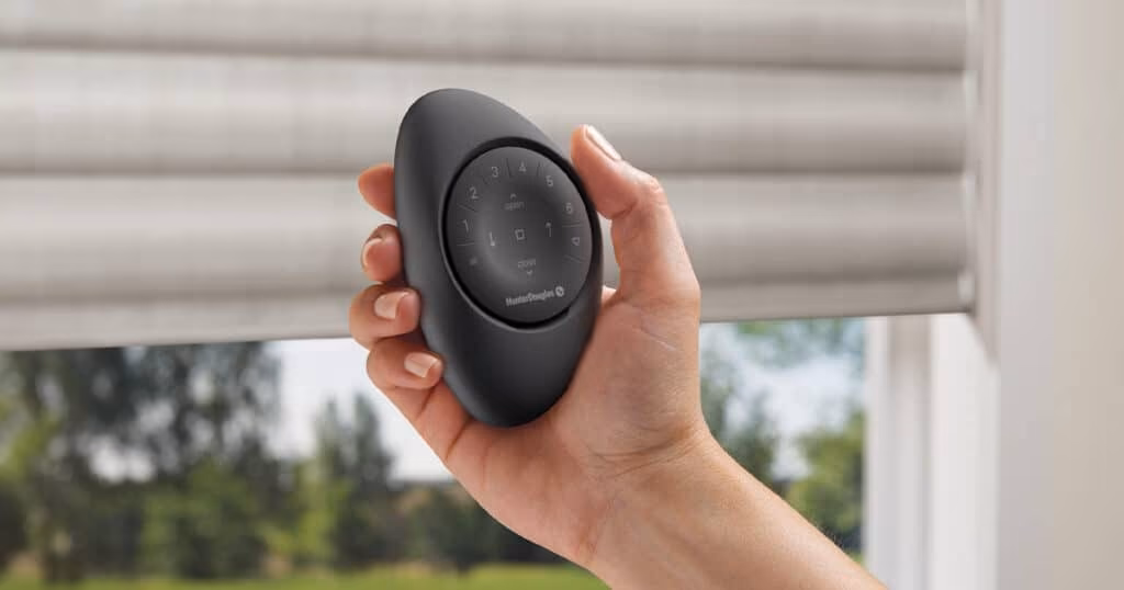 Hunter Douglas Pebble Remote controlling motorized wood blinds