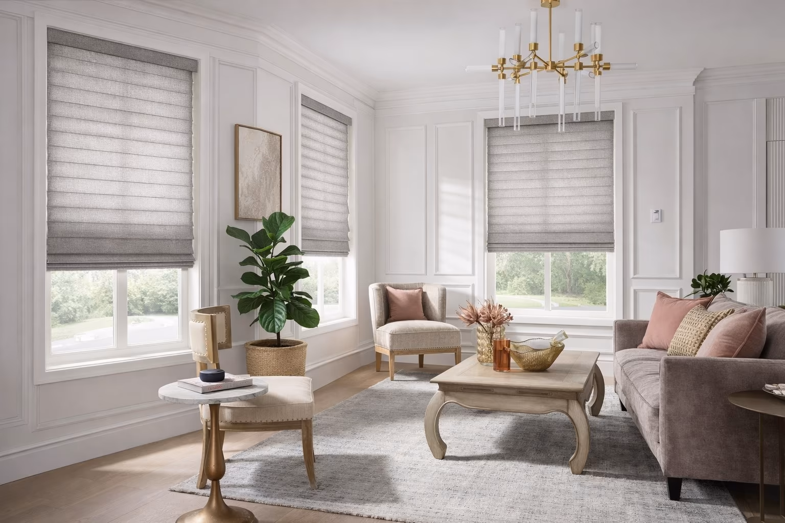 Hunter Douglas Vignette Roman Shades with tailored fabric folds in a formal living room with crystal chandelier white wainscoting and pink accent pillows, installed by La Grange Window Coverings
