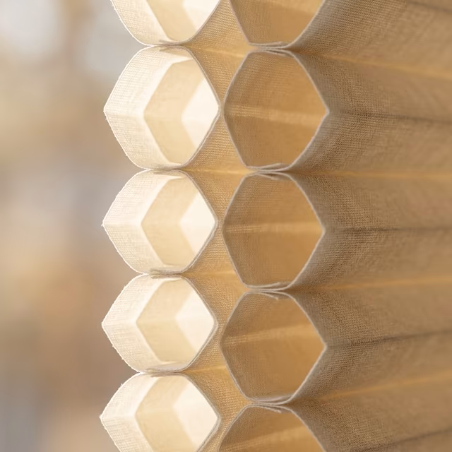 Hunter Douglas Duette Architella honeycomb shade double-cell construction detail showing R-7.0 insulation cross-section with natural light filtering through semi-opaque fabric installed by La Grange Window Coverings Windsor CA 95492